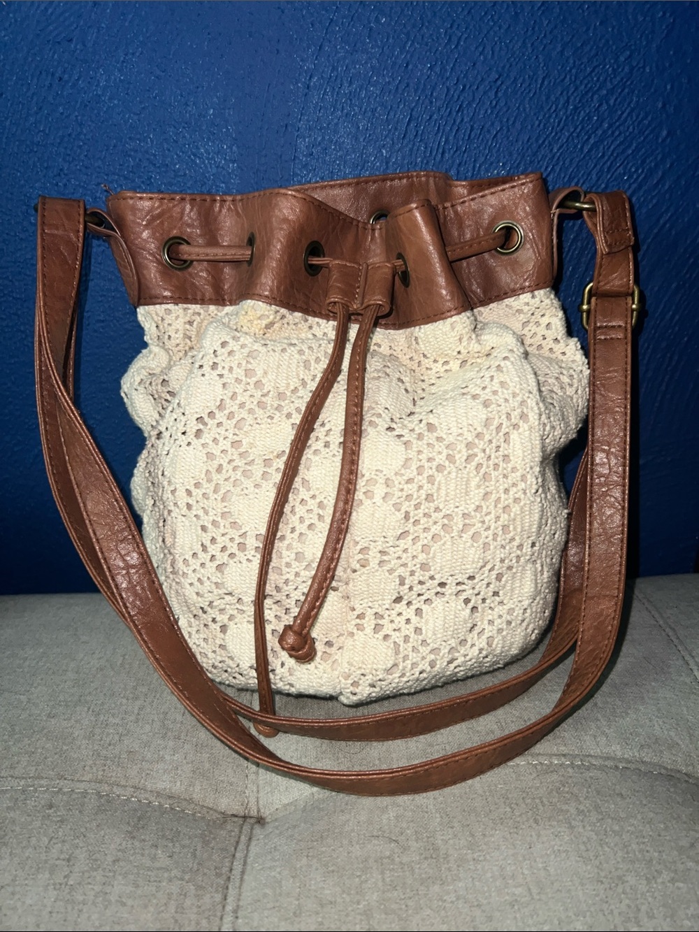 Cream Crochet Drawstring Bucket Bag with Brown Trim